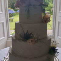 Wedding Cake 2 The Bride requested buttercream which wasn't "perfect" looking and wanted a natural theme with the flowers.