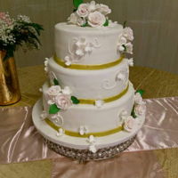 Simple Elegance This elegant 3 tier wedding cake was made of sugar gum paste flowers