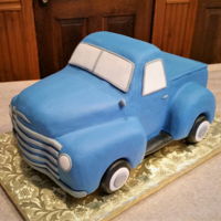 Vintage Chevy Truck Classic truck ordered by a grandaughter for 80th birthday. Wheels are rice cereal treats, everything else is cake.