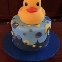 Baby Shower Cake For My Daughter. This was a Dutch chocolate cake filled with blue buttercream. Covered in milk chocolate ganache then fondant. The theme was Duckies so it...