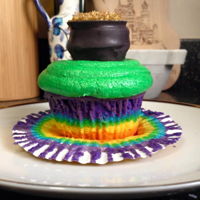 Pot Of Gold Cupcakes Rainbow cupcakes (WASC recipe) with cake ball pots of gold. Unfortunately, the buttercream started to break and I couldn't fix it...