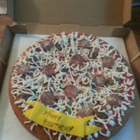 Pizza Cake Pizza Cake14" yellow cake round for crust (trimmed a bit out of the center so the edges were taller). Red buttercream "tomato...