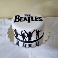 The Beatles Beatles themed cake