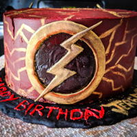 "the Flash" Cake Make a "Flash" cake inspired from the newer, darker costume design. Chocolate cake with chocolate ganache.