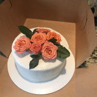 Buttercream With Fresh Roses! Vanilla cake iced with homemade buttercream topped with fresh roses! I made this the other day, a loved one passed away that was a close...