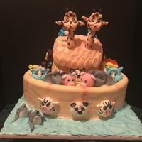 Noah's Ark Theme Cake Noah's Ark is made of marble flavored cake ,with Oreo cream cheese filling. All decorations were made out of gumpaste