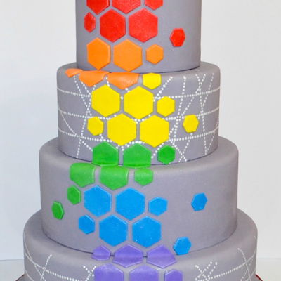 Grey And Rainbow Colored Geometric Wedding Cake