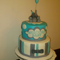 Baby Shower Cake Fondant elephant with balloon and fondant accents.