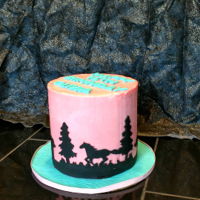 Horse Silhouette Cake A marble cake with swiss meringue frosting. The silhouettes are hand cut from fondant.