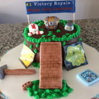 Fortnite Cake 9&rdquo; double layer cake with chocolate frosting. All decorations made out of fondant