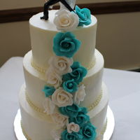 Gumpaste Rose Cascade In Turquoise And White This cake was a 6, 8, 10 inch tiers done in Swiss Meringue Buttercream with a cascade of Gum paste Roses from my Etsy Shop "...