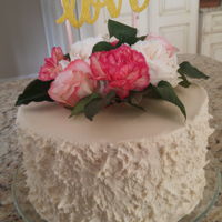 Personal Shower Cake Vanilla pound cake, textured buttercream, real flowers.