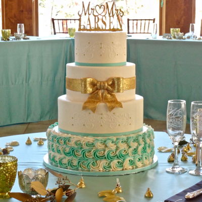 Elegant Sparkling Gold And Tiffany Blue Accents On Buttercream
