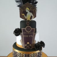 Gatsby Themed 21St Birthday Cake Bottom tier is chocolate with dark chocolate ganache under the fondant and the top 2 are vanilla hd sponge with raspberry and vanilla...
