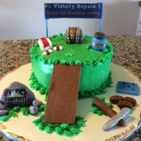 Fortnite Cake 9 inch double layer cake with buttercream frosting and fondant decorations