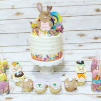 Happy Easter Buttercream Cake With Fondant And Candy Accents Chocolate Coverd Rice Krispies Treats Fondant Cupcakes