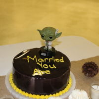 Yoda Grooms Cake Black mirror glaze cake with Yoda