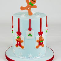 Gingerbread Boy & Girl Christmas Cake Loved putting this Christmas Cake together. I love how the blue compliments the colour of the gingerbread people and works perfectly with...