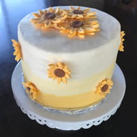Yellow Sunflower Yellow Ombre butterceam cake with gumpaste sunflowers.