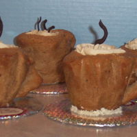 Rustic Coffee Mugs Vanilla cake filled with chocolate mousse and buttercream and chocolate designs. These cakes were made using foil which was placed in a...