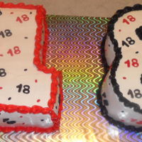 18Th Birthday Red Velvet and Chocolate cakes with cream cheese frosting and modeling chocolate decorations