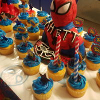 Spider-Man Bust And Cupcakes Fondant and buttercream. Not the greatest looking but it was my first try at a bust.
