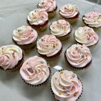 Baby Shower Cupcakes Cupcakes frosted with cream cheese frosting and sprinkles