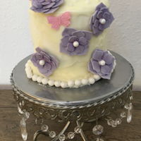 Mini Cake With Flowers Royal icing flowers on a mini cake.