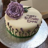 Rose With Chocolate Cake Goey Chocolate Cake with whites chocolate icing and flower paste purple rose