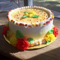 Rikki's Fourtieth Buttercream with buttercream flowers. Decorated with help by my 7 year old granddaughter Edie!