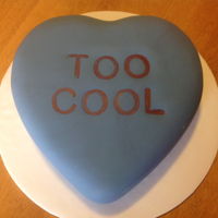Conversation Heart Fondant covered cake with Wilton Stamp tool for lettering.