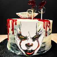 Pennywise hand painted image on gumpaste....isomalt numbers with piping gel blood and a fondant boat....