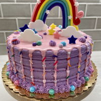 Birthday Cake Butter cream cake with fondant decorations and sprinkles